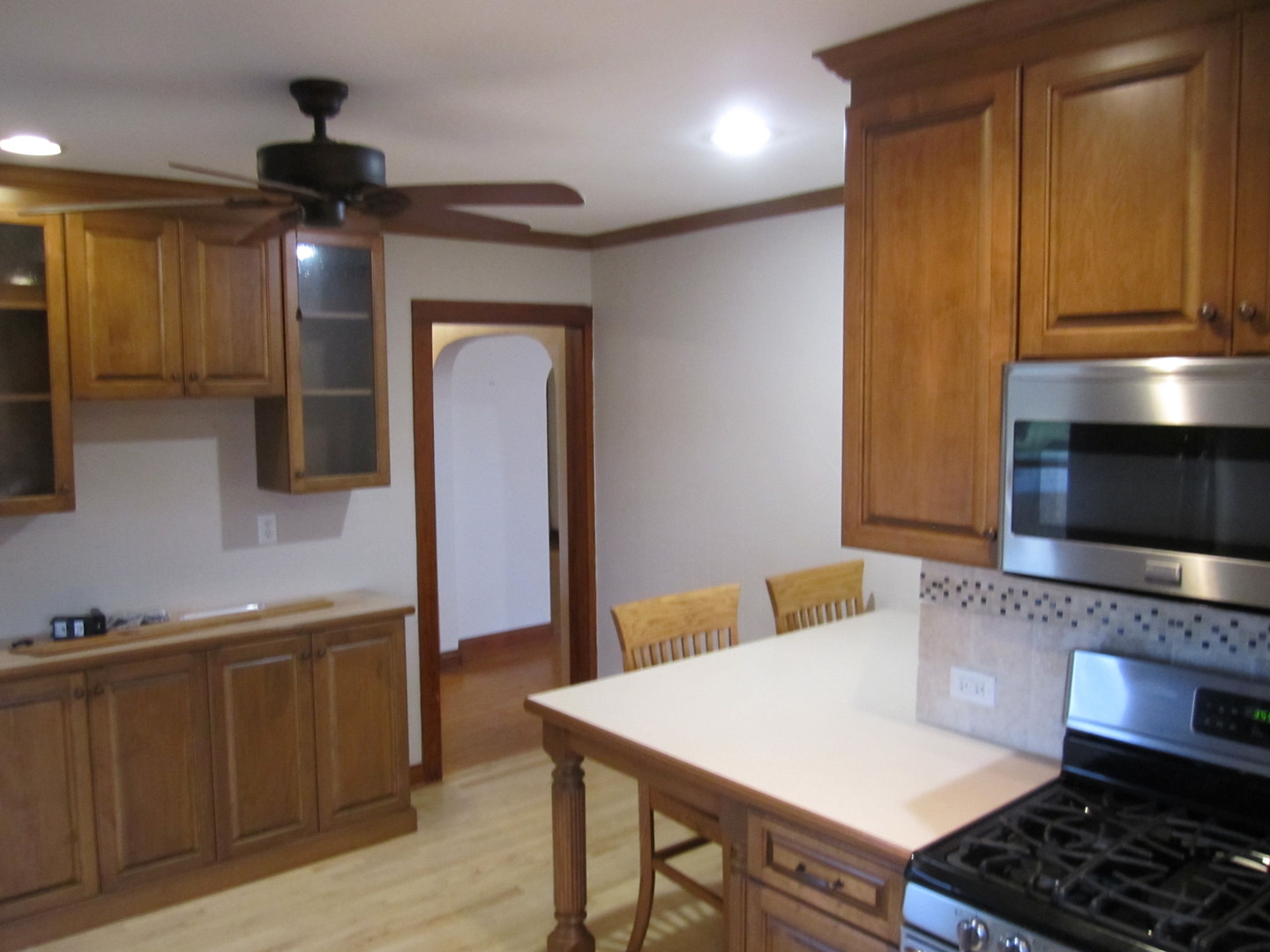 38 Highway Maple Park, IL 60151 - Photo 21 of 29 a kitchen with a stove and a refrigerator