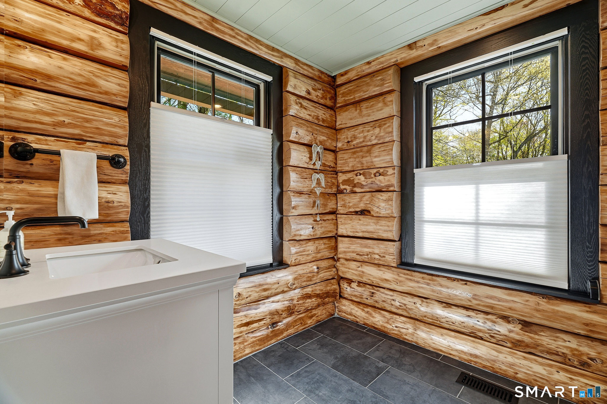 61 Mystic Road North Stonington, CT 06359 - Photo 23 of 40 a bathroom with a bathtub and a window