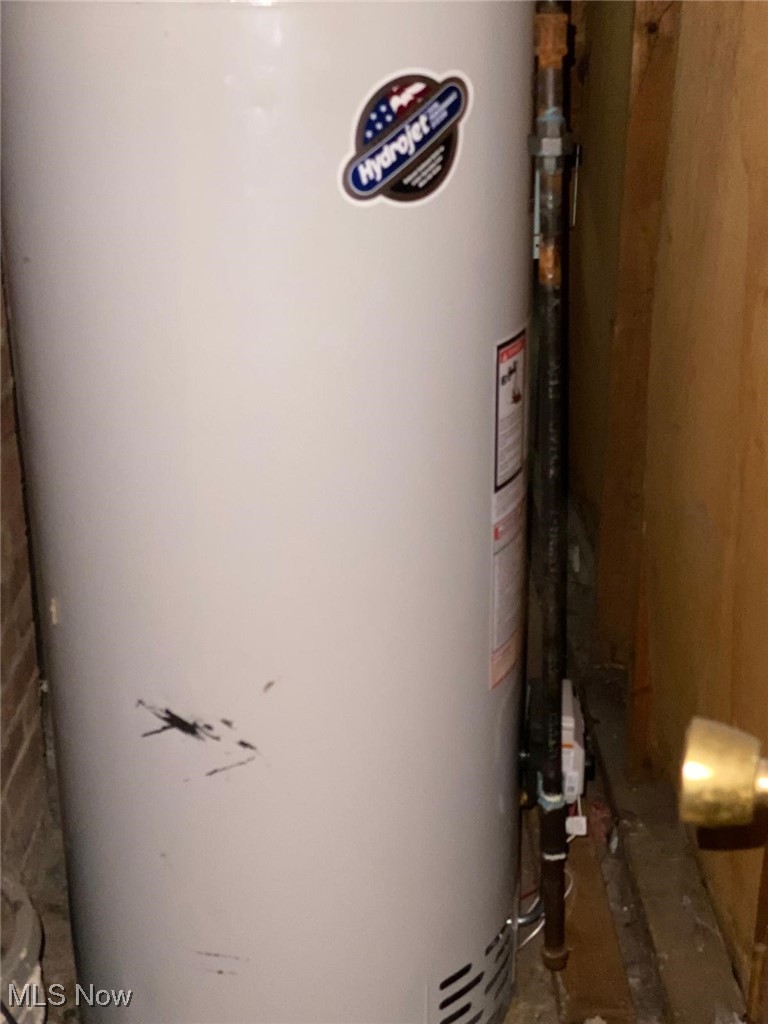 17011 Ridgeton Drive Cleveland, OH 44128 - Photo 32 of 35 Utility room with water heater