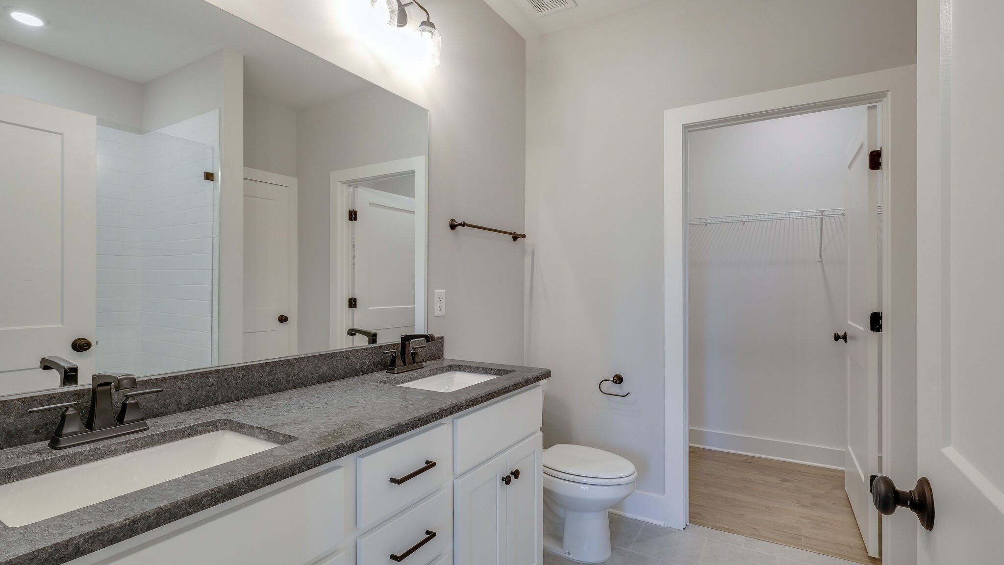91 Camrose Way Murfreesboro, TN 37128 - Photo 17 of 25 a bathroom with a granite countertop sink toilet and shower