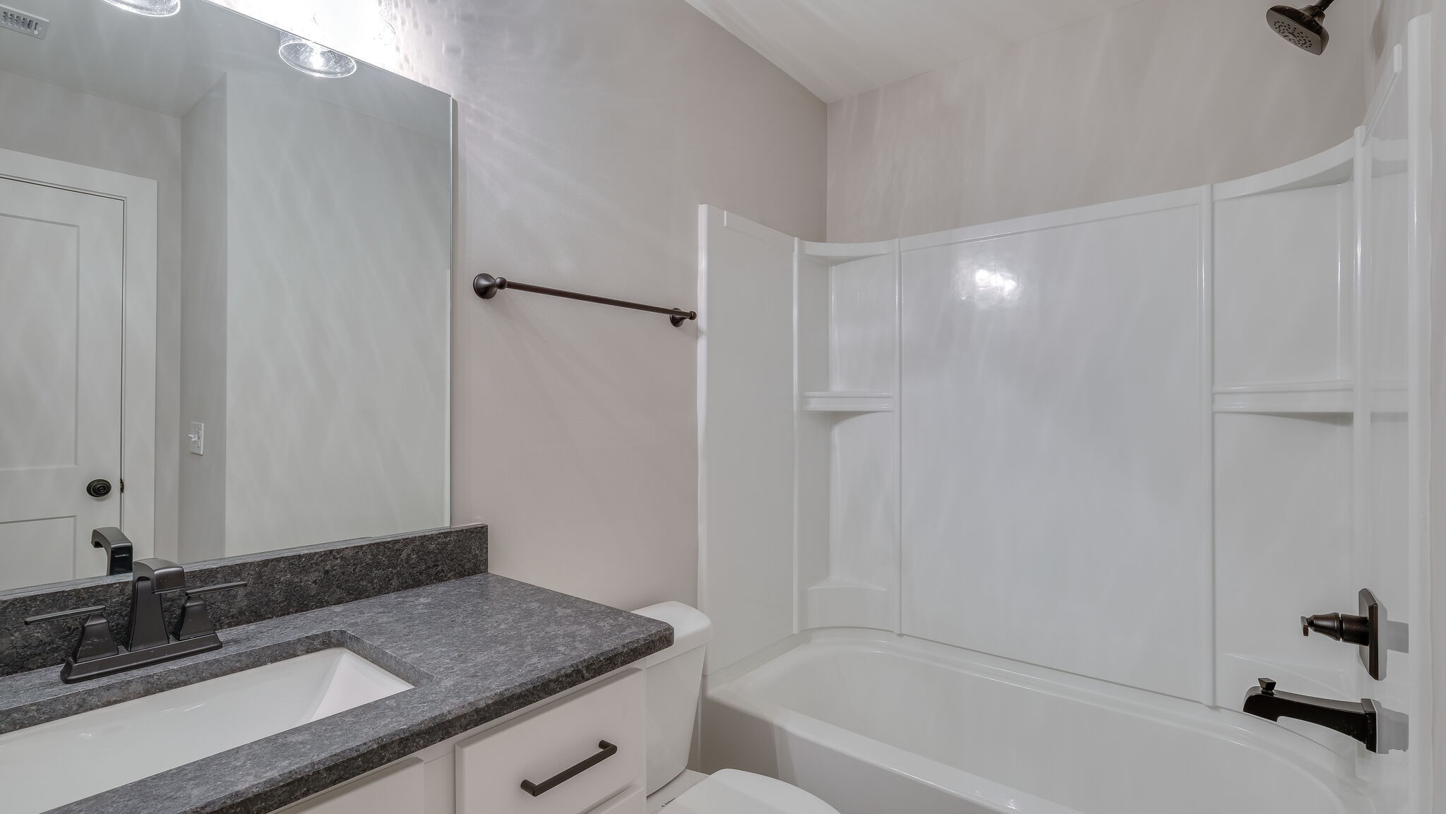 91 Camrose Way Murfreesboro, TN 37128 - Photo 24 of 25 a bathroom with a granite countertop sink and a mirror