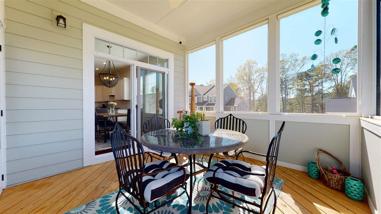 401 Saddletop Court, Unit PRITCHETT FARM ESTATES Raleigh, NC 27606 - Photo 23 of 30 Screened Porch open to Dining Area