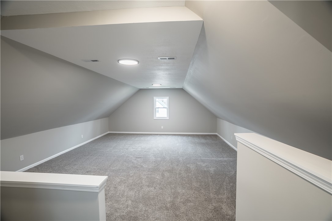 8240 Looney Road Piqua, OH 45356 - Photo 31 of 49 This spacious attic conversion offers abundant potential for a custom living area.