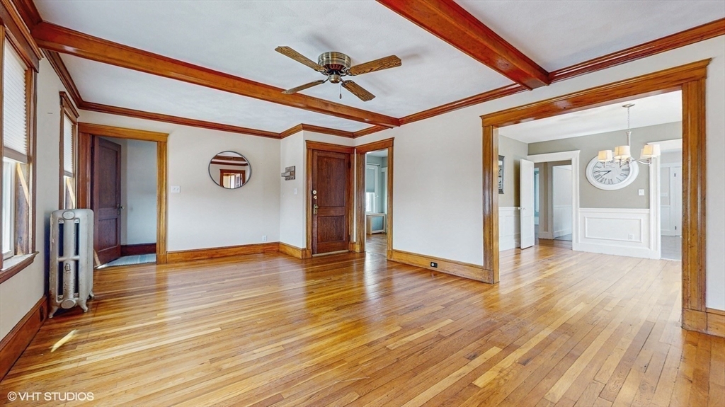 68 Bradford Road Watertown, MA 02472 - Photo 15 of 42 a view of an empty room with wooden floor