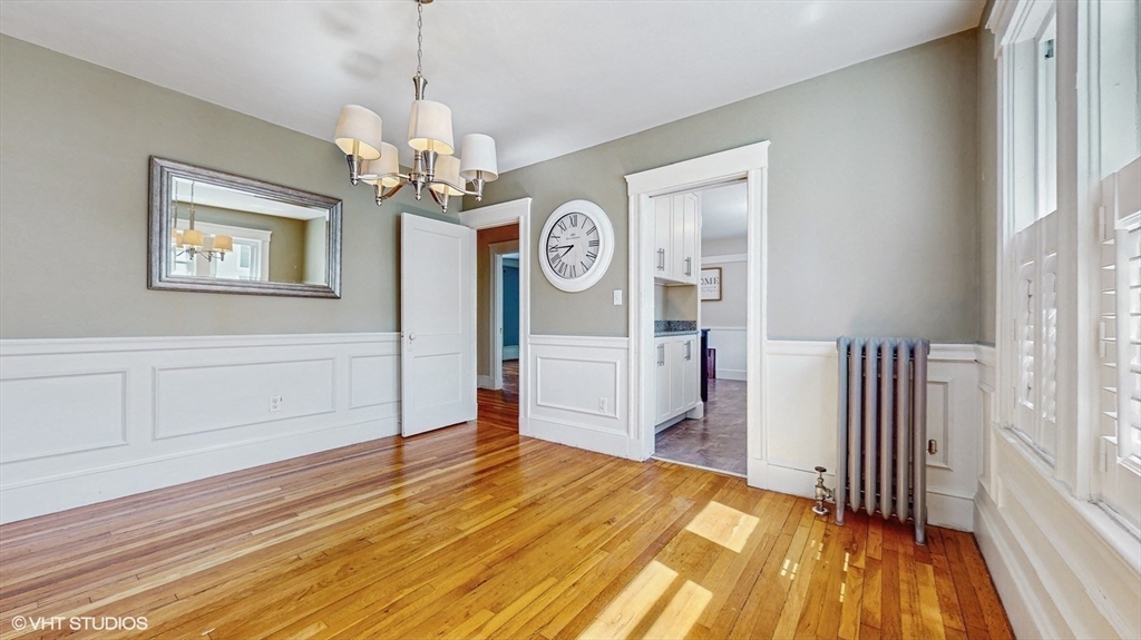 68 Bradford Road Watertown, MA 02472 - Photo 18 of 42 a view of a bedroom with wooden floor