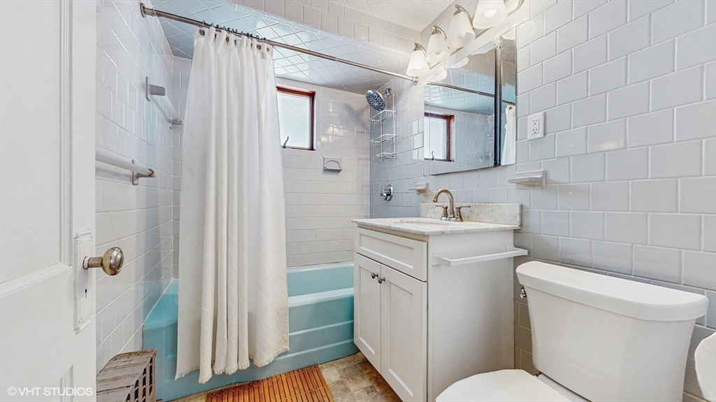 68 Bradford Road Watertown, MA 02472 - Photo 27 of 42 a bathroom with a toilet sink and shower
