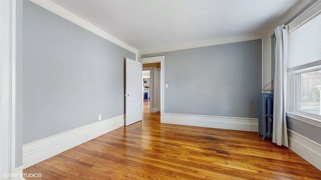 68 Bradford Road Watertown, MA 02472 - Photo 32 of 42 a view of wooden floor in an empty room