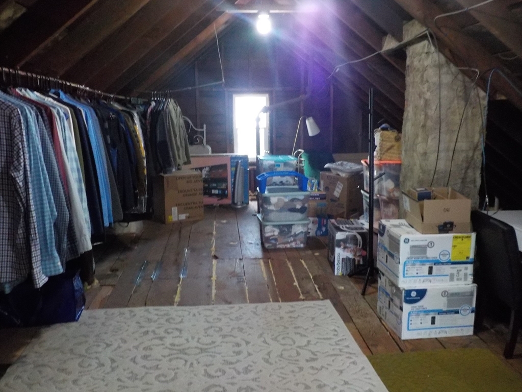 68 Bradford Road Watertown, MA 02472 - Photo 33 of 42 a view of walk in closet with clothes and shoes