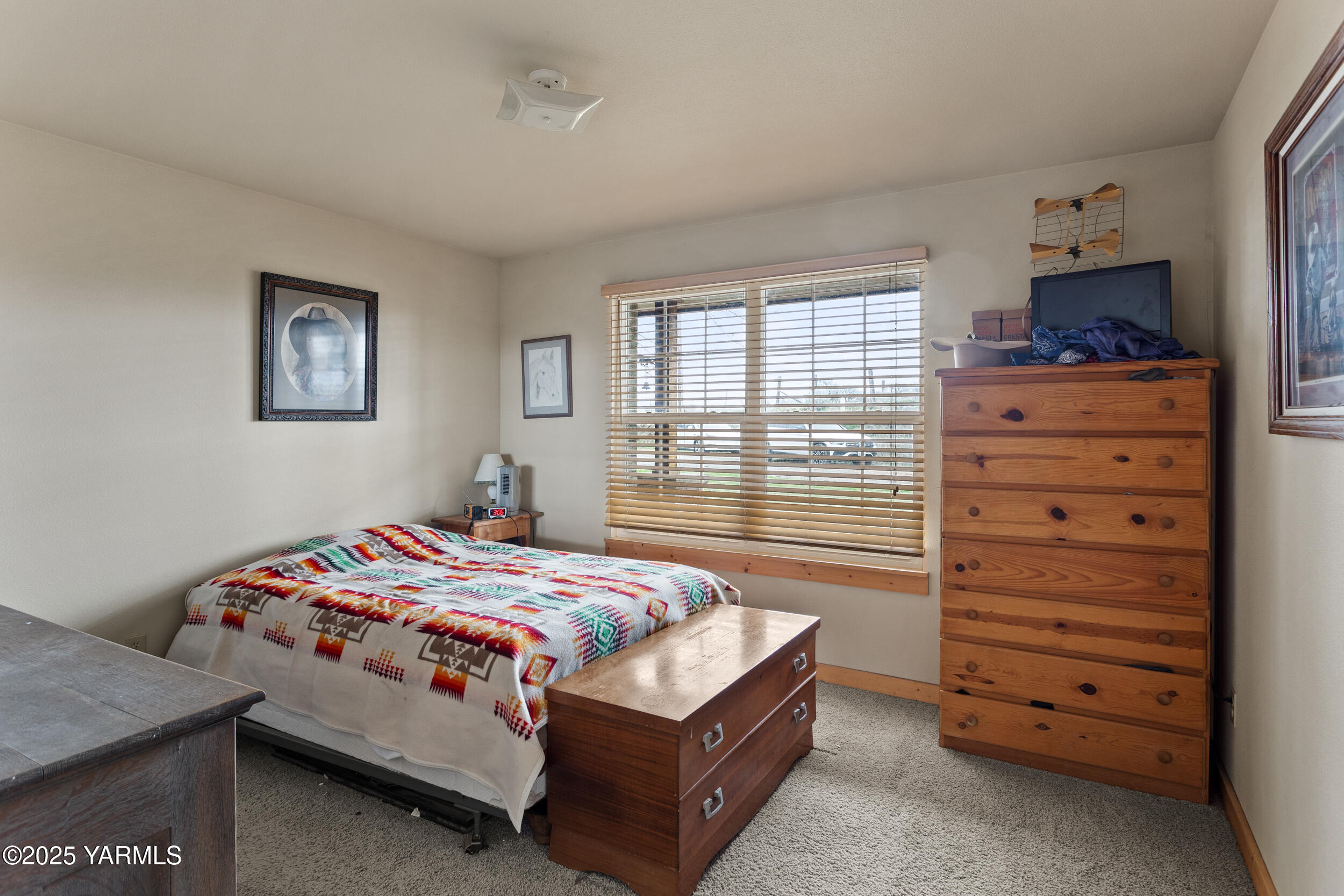 12004 Branch Road Harrah, WA 98933 - Photo 22 of 71 a bedroom with a bed and a window