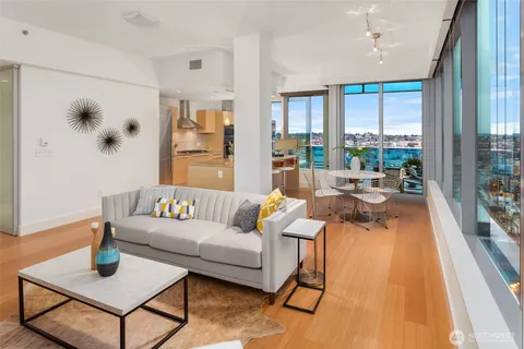 a view of a living room with a large window