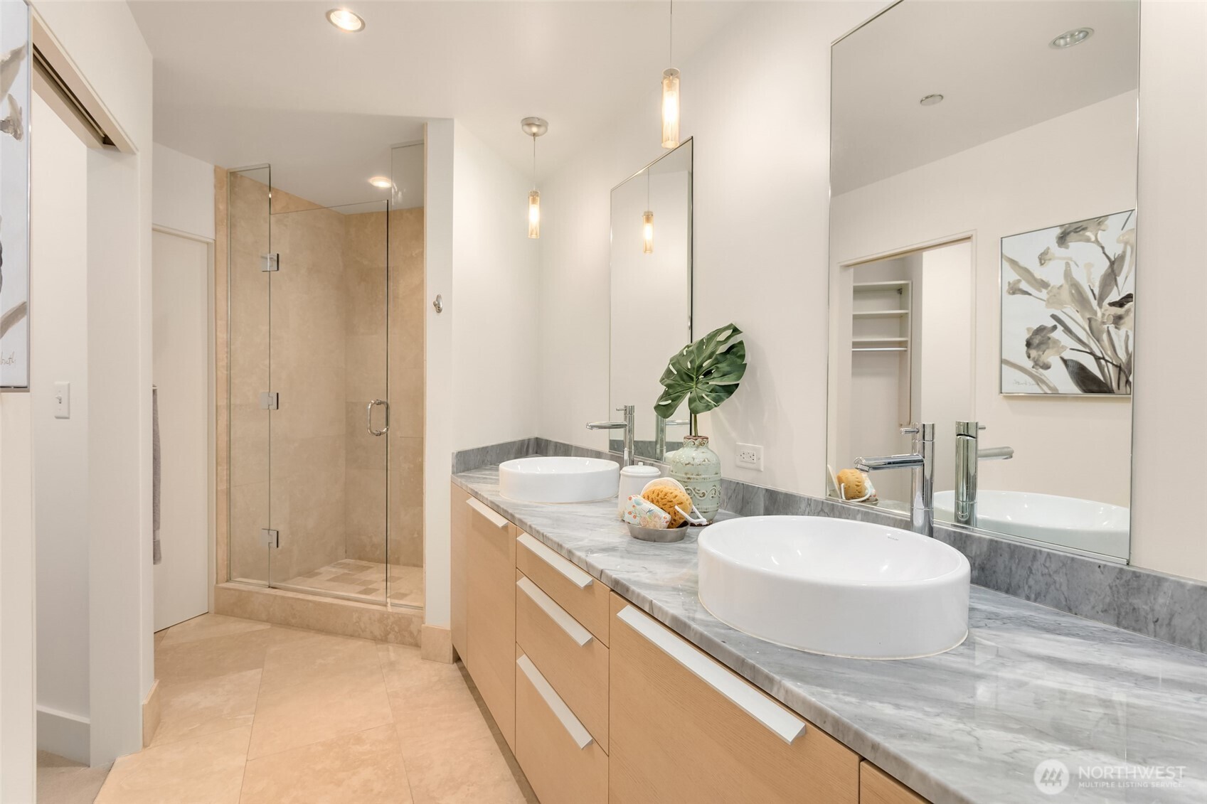 737 Olive Way, Unit 2905 Seattle, WA 98101 - Photo 19 of 38 a bathroom with a granite countertop sink and a mirror