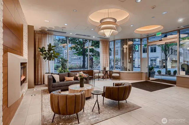 a living room with furniture and a large window