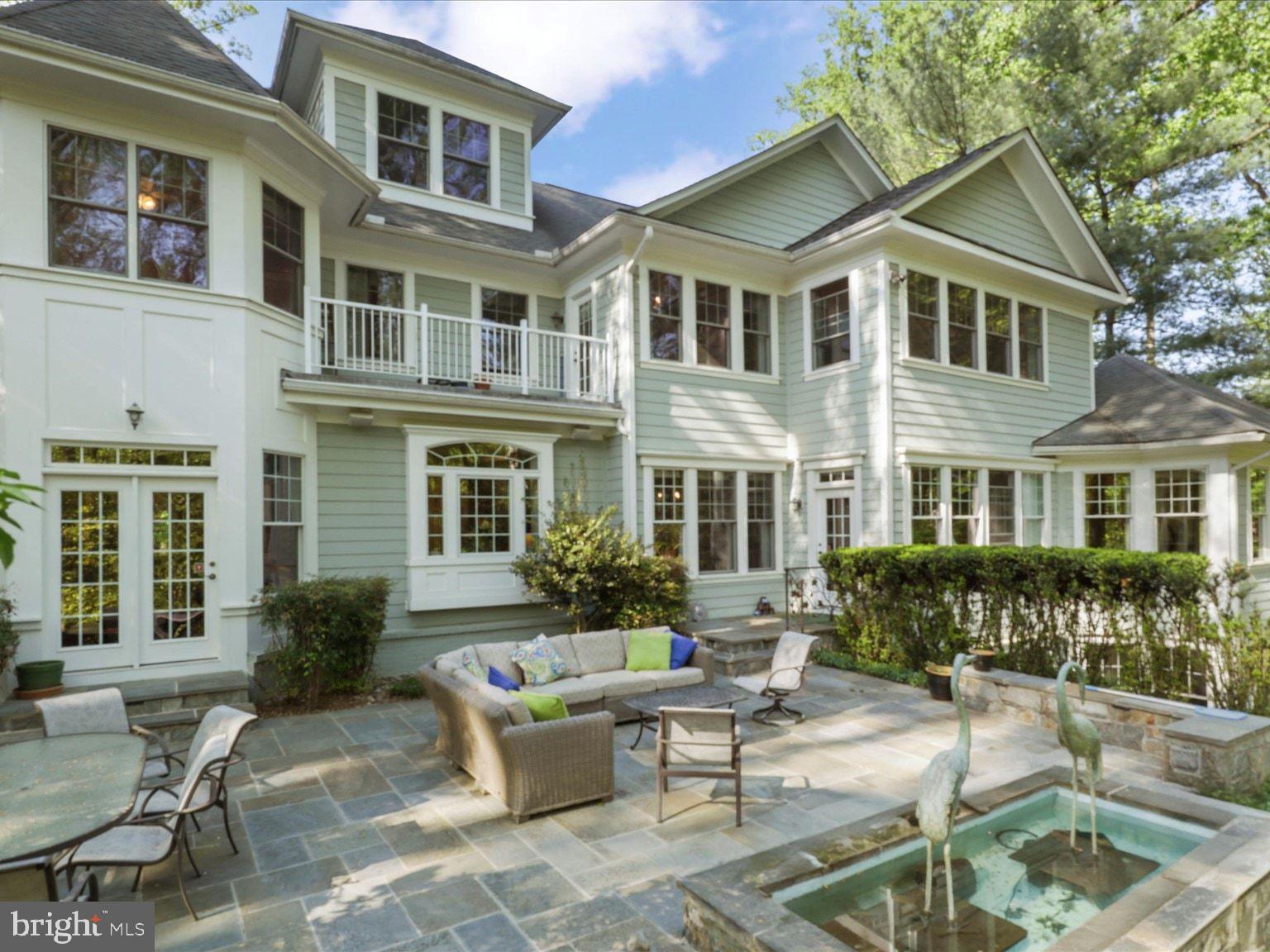 1889 Virginia Avenue McLean, VA 22101 - Photo 5 of 42 a view of a house with a patio