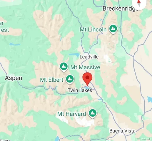 a sign that is sitting on a wooden floor