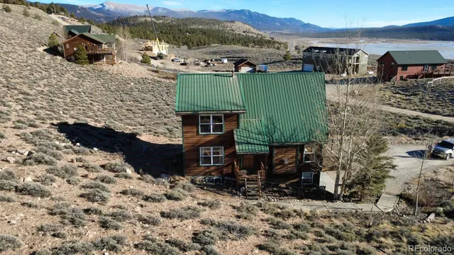 a view of a chairs and table in the patio