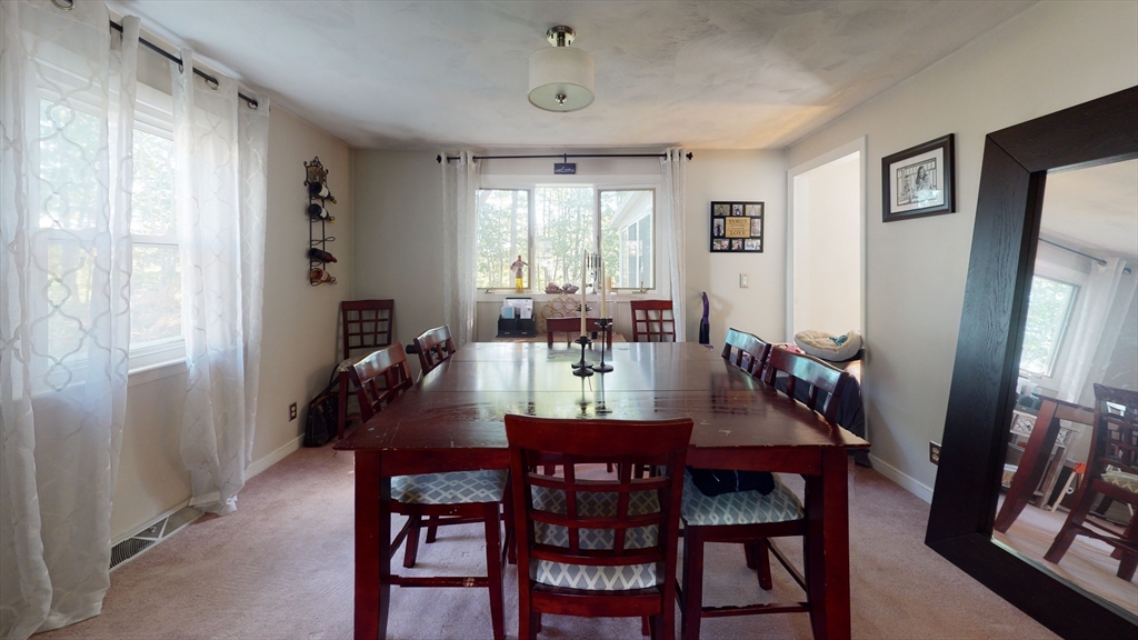 37 Centre Street Natick, MA 01760 - Photo 3 of 8 a view of a dining room with furniture window and wooden floor