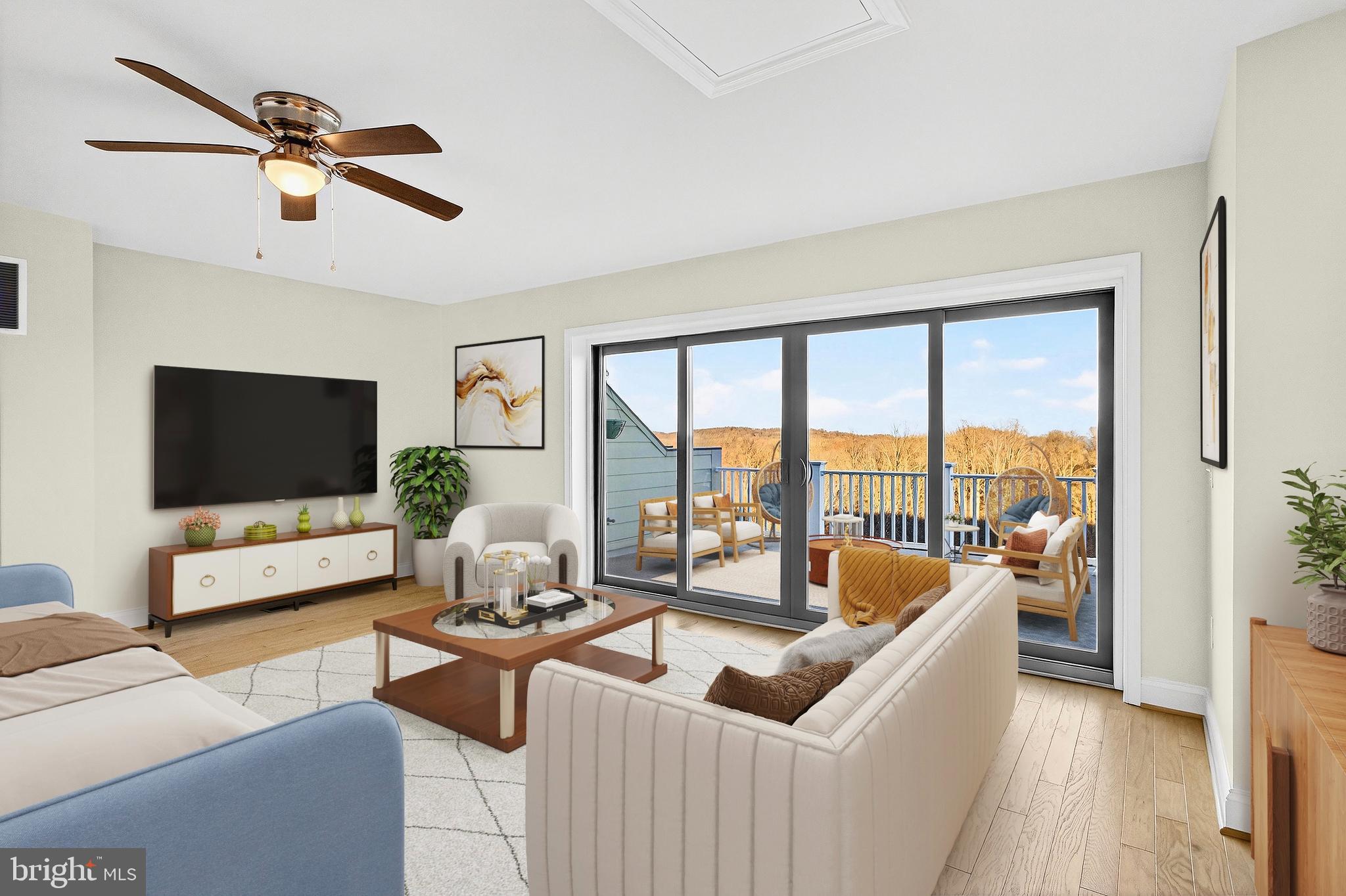 17161 Branched Oak Road Dumfries, VA 22026 - Photo 18 of 28 a living room with furniture and a flat screen tv