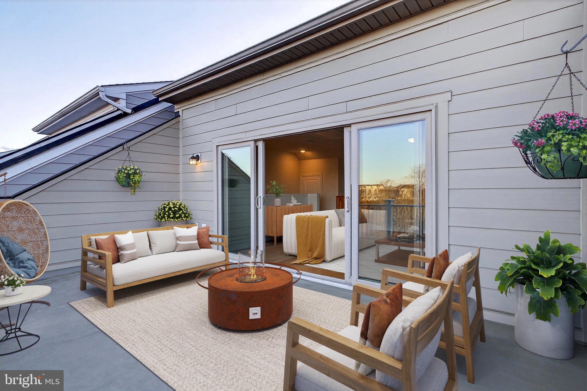 17161 Branched Oak Road Dumfries, VA 22026 - Photo 21 of 28 a outdoor living space with furniture potted plant and a large window