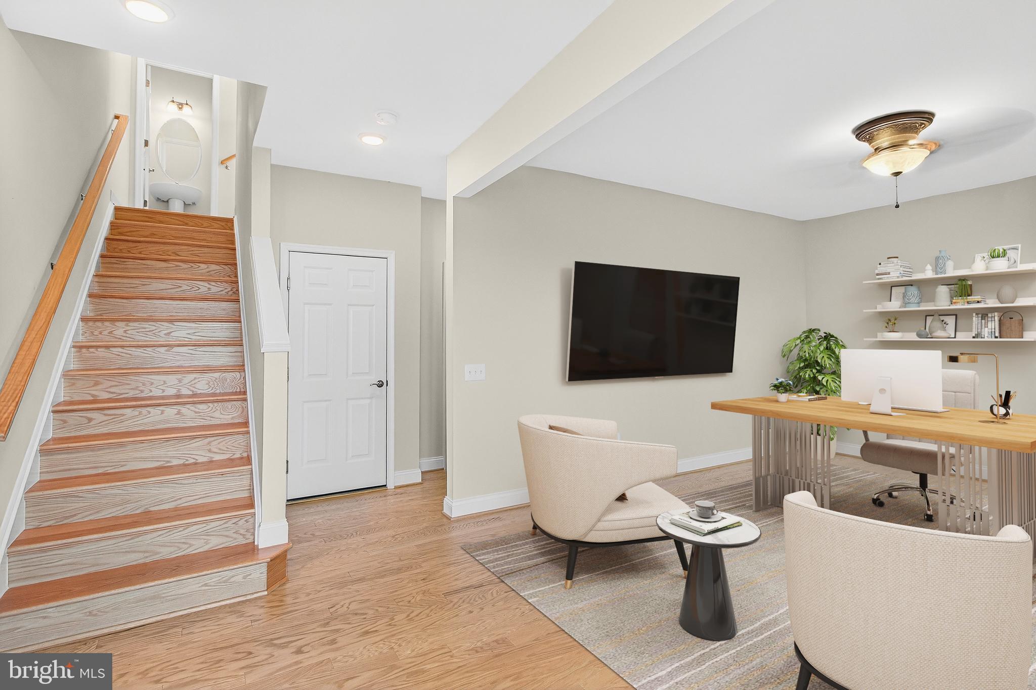 17161 Branched Oak Road Dumfries, VA 22026 - Photo 5 of 28 a living room with furniture and a flat screen tv