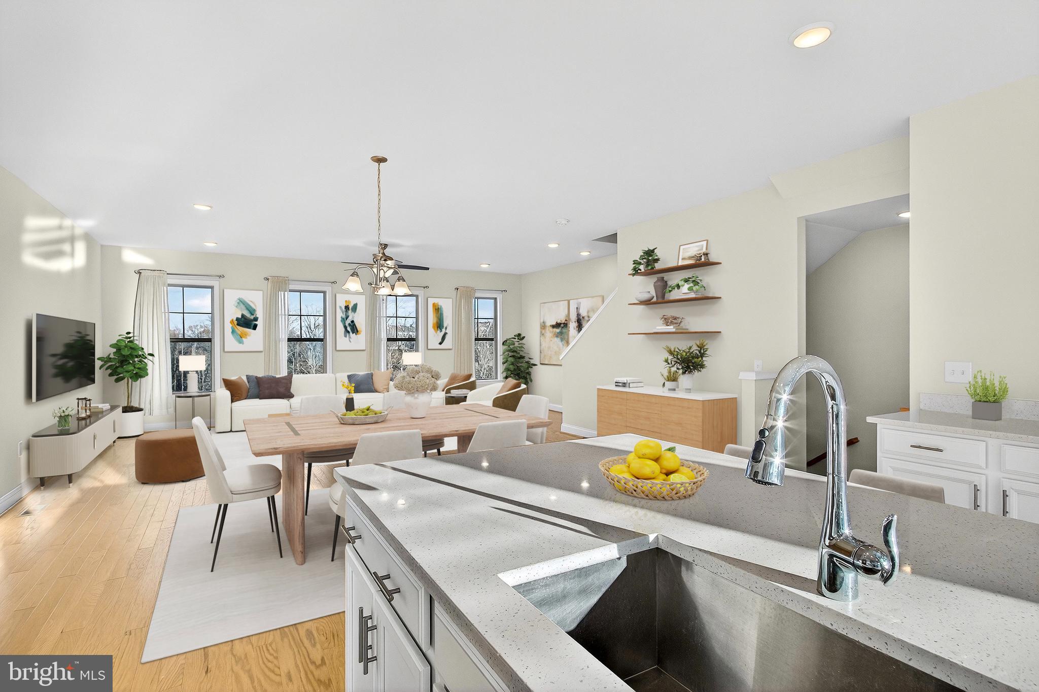 17161 Branched Oak Road Dumfries, VA 22026 - Photo 10 of 28 a kitchen with sink refrigerator and microwave