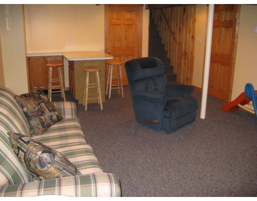 72 Oak Hollow Road Springfield, MA 01128 - Photo 11 of 14 a living room with furniture windows and a wooden floor