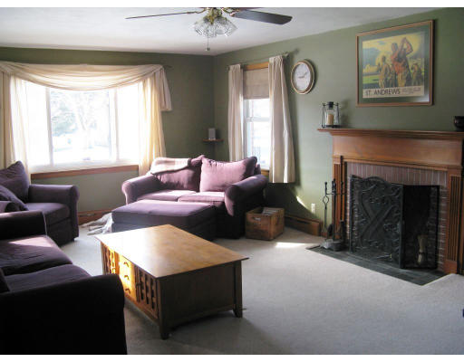 72 Oak Hollow Road Springfield, MA 01128 - Photo 5 of 14 a living room with furniture and a fireplace
