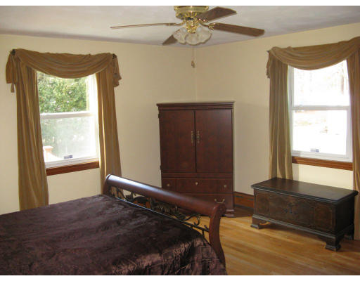 72 Oak Hollow Road Springfield, MA 01128 - Photo 9 of 14 a bedroom with a bed and a window
