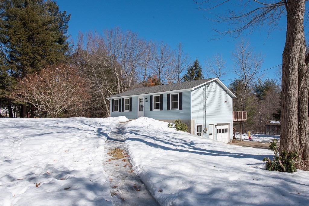 112 Barre Paxton Road Rutland, MA 01543 - Photo 2 of 36 a view of house with yard and covered in snow