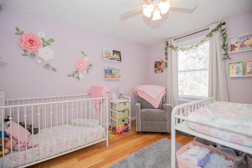 112 Barre Paxton Road Rutland, MA 01543 - Photo 21 of 36 a bedroom with a bed and a window