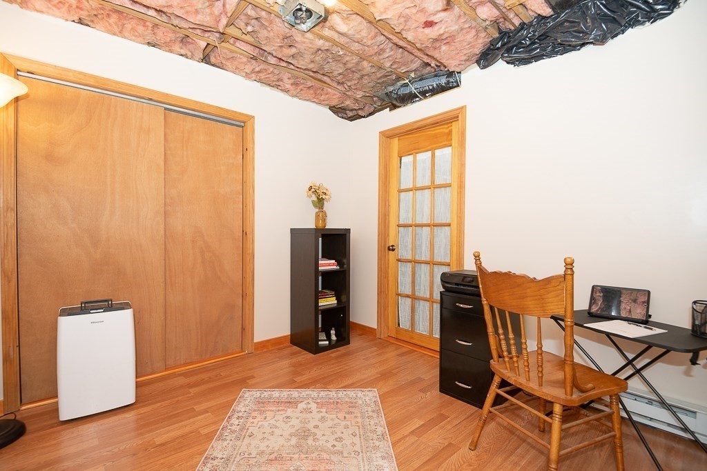 112 Barre Paxton Road Rutland, MA 01543 - Photo 28 of 36 a view of a room with furniture and a window