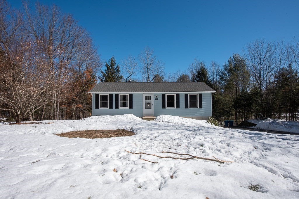 112 Barre Paxton Road Rutland, MA 01543 - Photo 3 of 36 a front view of a house with a yard