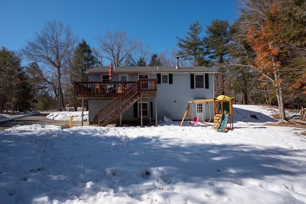 112 Barre Paxton Road Rutland, MA 01543 - Photo 35 of 36 a view of a house with snow on the road