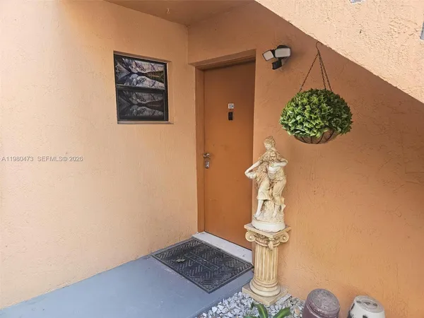 a vase of flowers sitting on a table