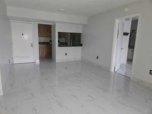 a kitchen with granite countertop cabinets stove and oven