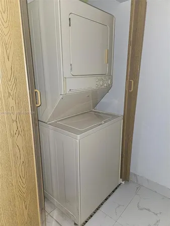 a view of an empty room with a sliding door