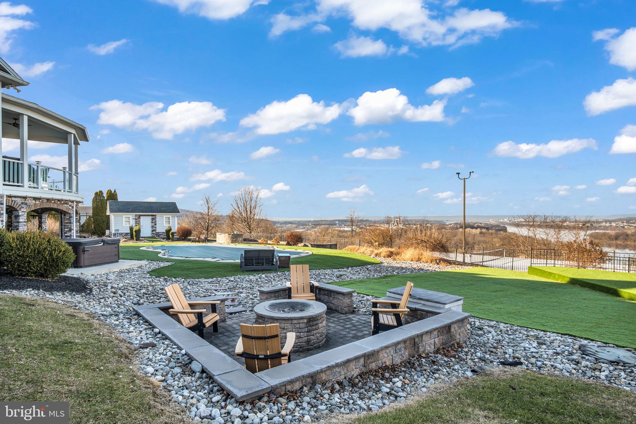 297 Thorley Road New Cumberland, PA 17070 - Photo 15 of 99 a view of a garden with lawn chairs