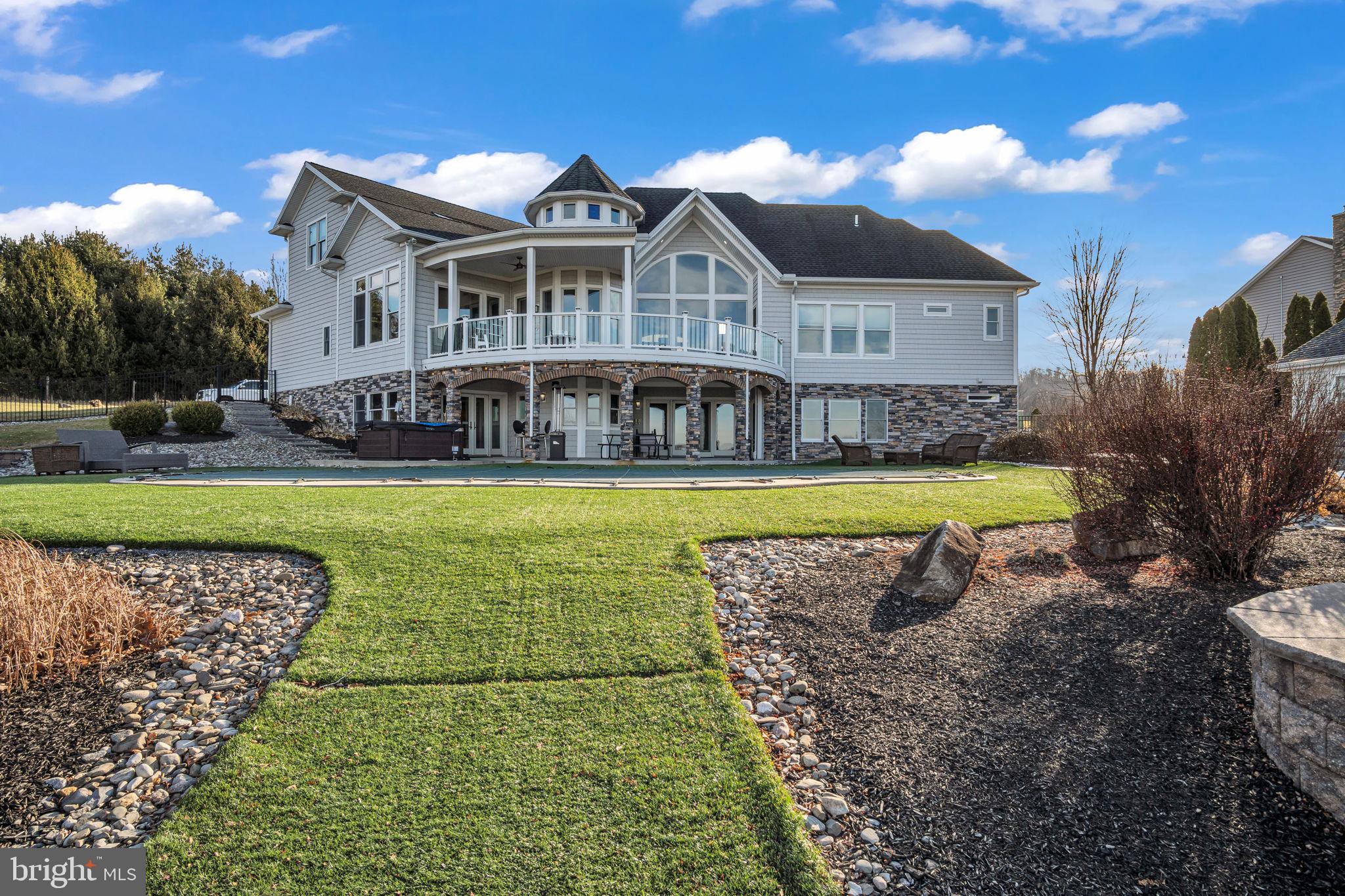 297 Thorley Road New Cumberland, PA 17070 - Photo 17 of 99 a view of a house with swimming pool and yard
