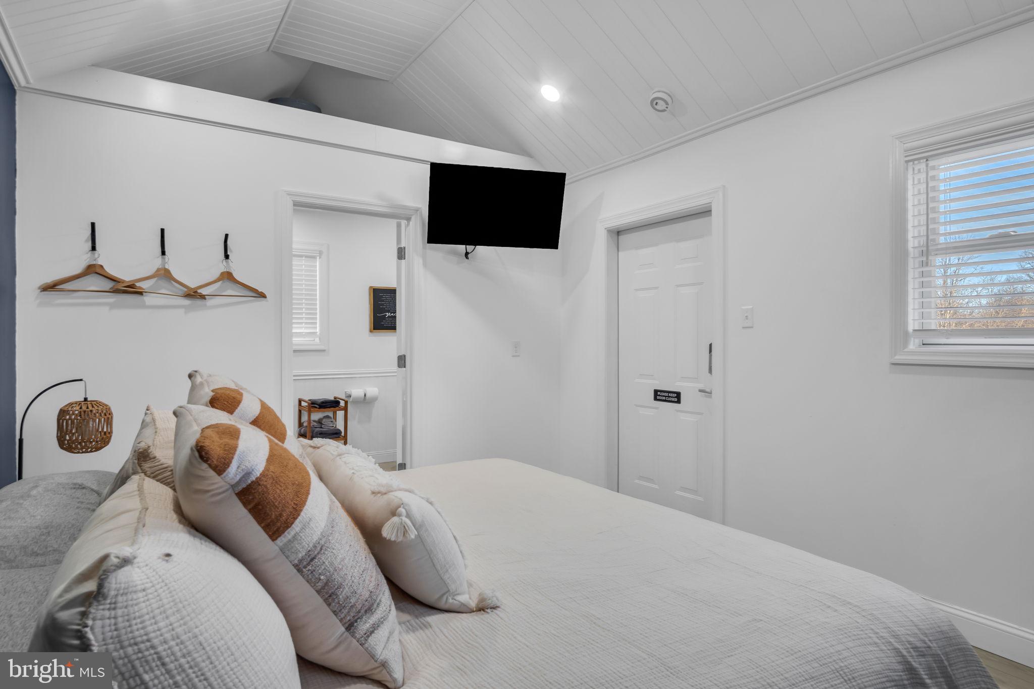 297 Thorley Road New Cumberland, PA 17070 - Photo 24 of 99 a bedroom with a bed and a tv