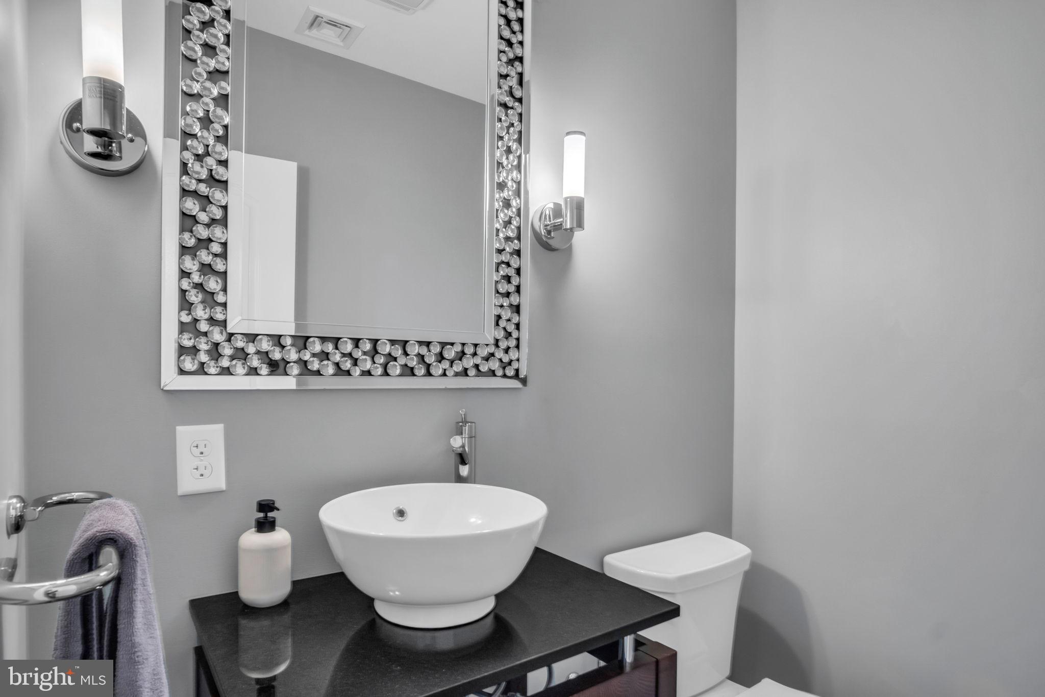 297 Thorley Road New Cumberland, PA 17070 - Photo 75 of 99 a bathroom with a toilet sink and mirror