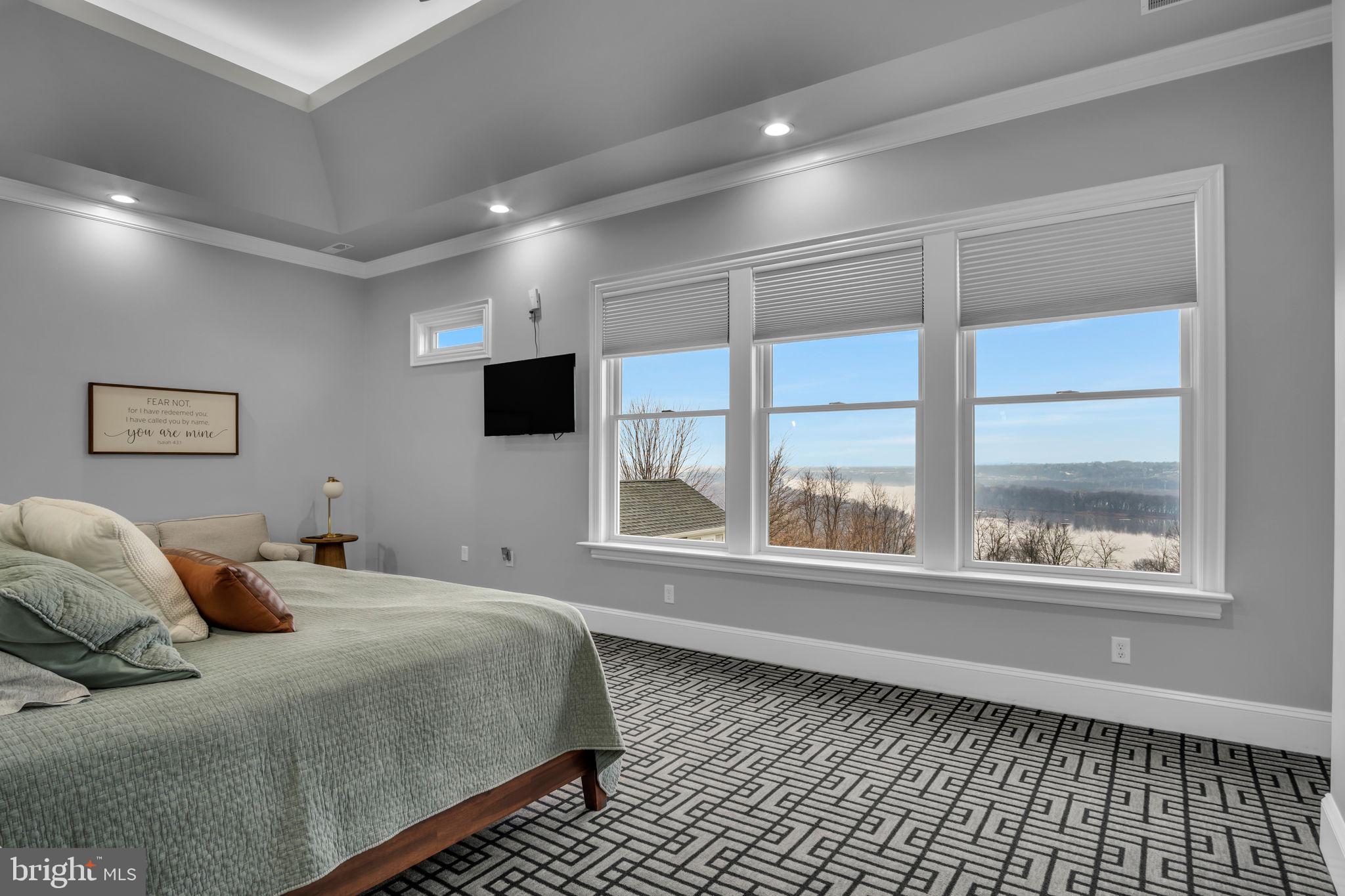 297 Thorley Road New Cumberland, PA 17070 - Photo 90 of 99 a bedroom with a large bed and a tv