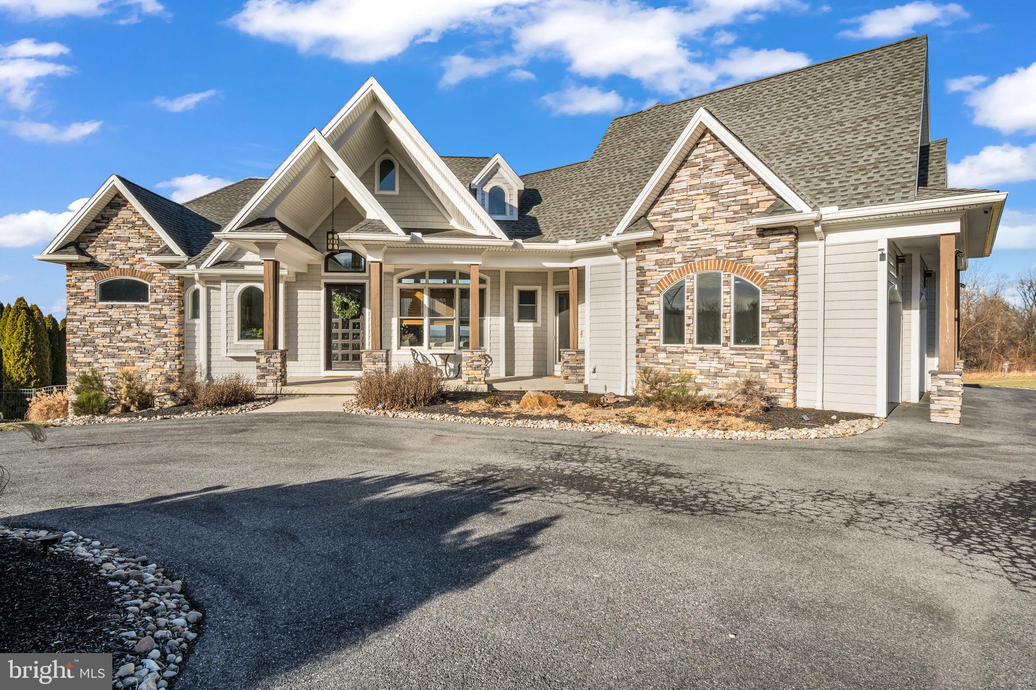 297 Thorley Road New Cumberland, PA 17070 - Photo 9 of 99 a front view of a house with a yard