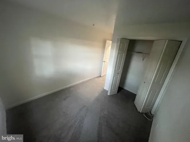 an empty room with a door