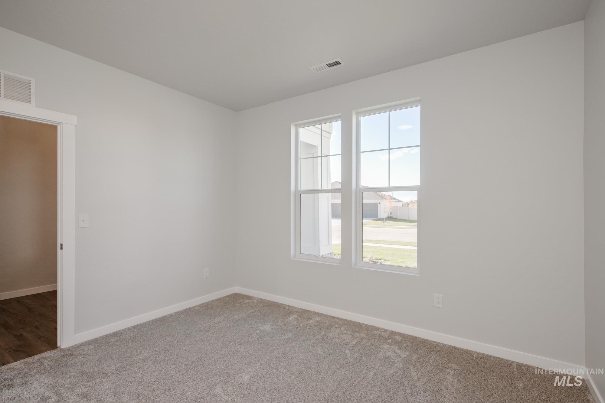 5304 Castleton Avenue Nampa, ID 83686 - Photo 15 of 25 Carpeted empty room with baseboards