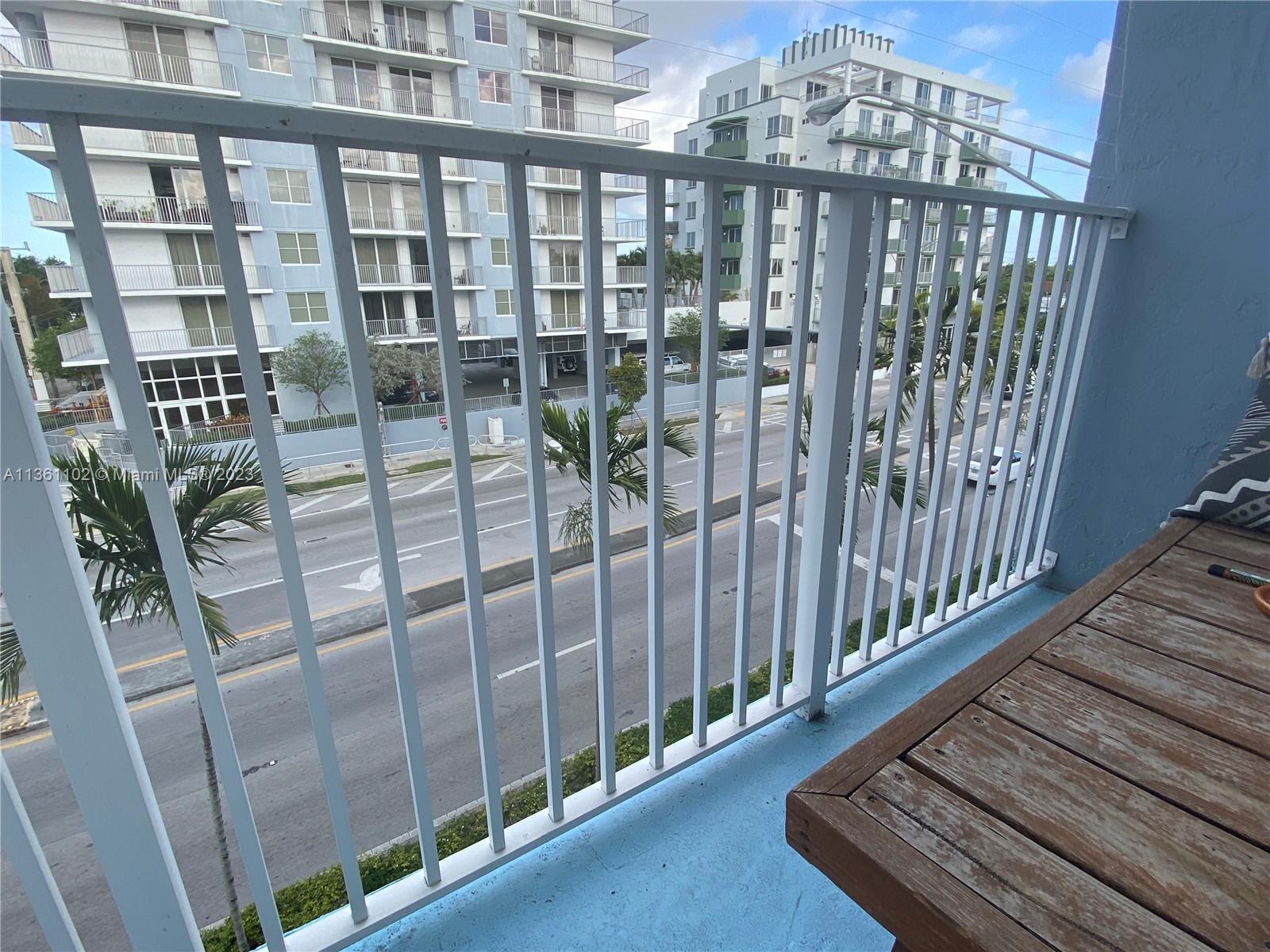 2575 Southwest 27th Avenue, Unit 409 Miami, FL 33133 - Photo 6 of 18 a view of a balcony with staircase
