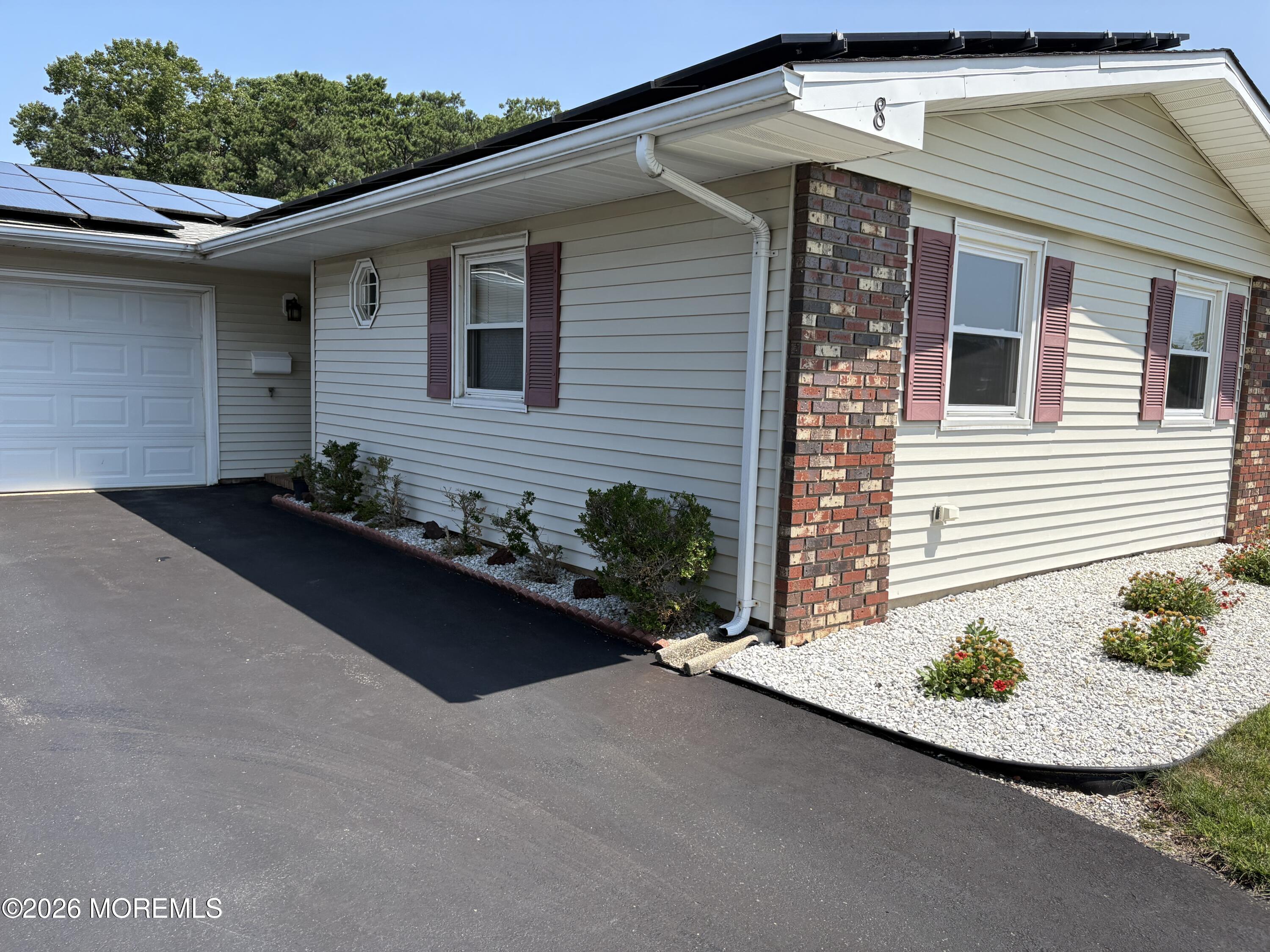 8 Dryden Road Brick, NJ 08724 - Photo 23 of 35 a front view of a house with a yard