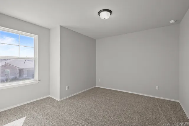 an empty room with a window