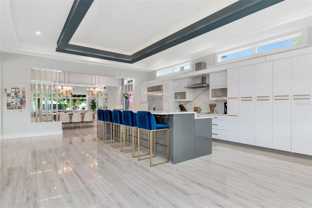 4936 West San Rafael Street Tampa, FL 33629 - Photo 11 of 42 a view of kitchen with furniture and wooden floor