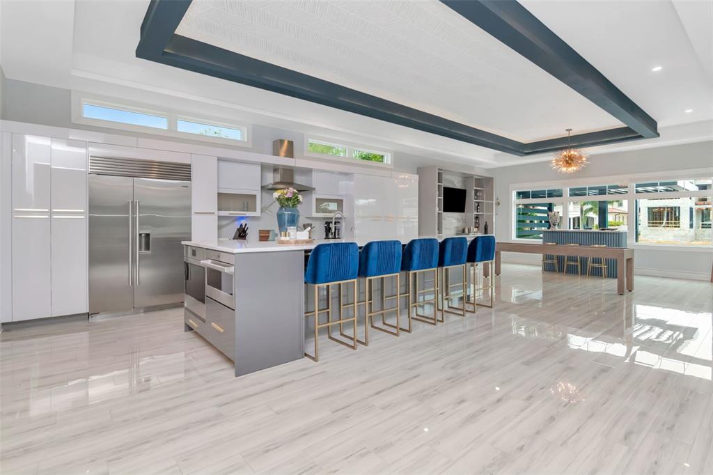 4936 West San Rafael Street Tampa, FL 33629 - Photo 13 of 42 a living room with furniture and a wooden floor