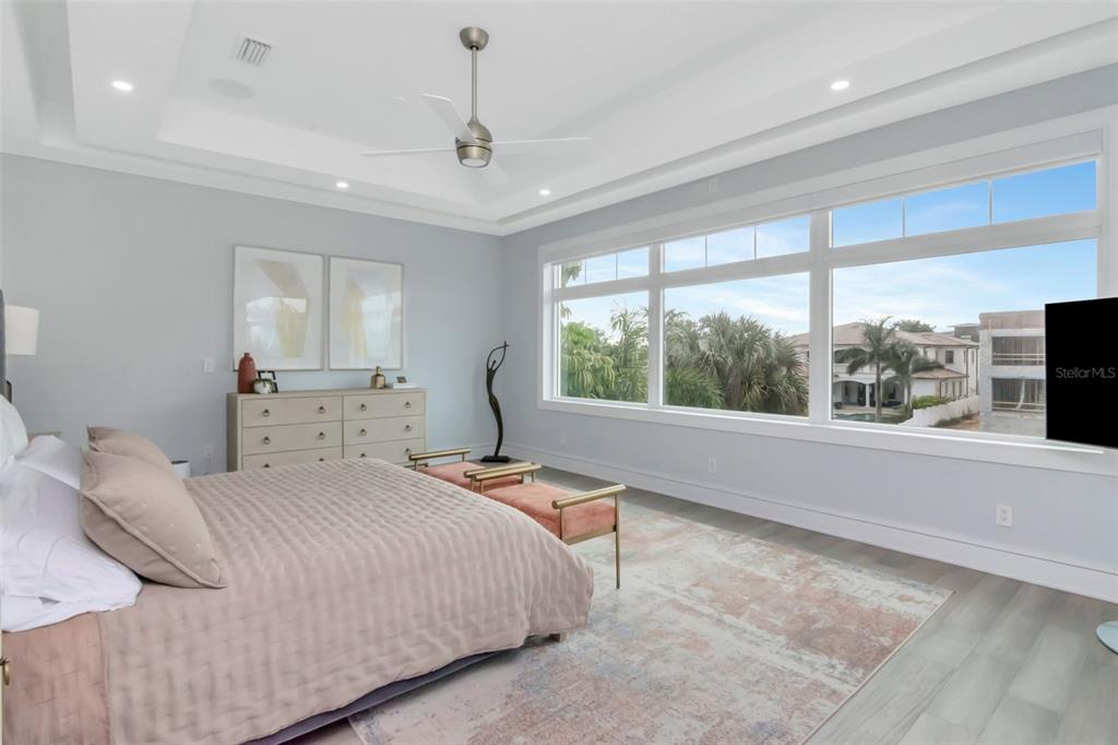 4936 West San Rafael Street Tampa, FL 33629 - Photo 20 of 42 a bedroom with a large bed and a large window