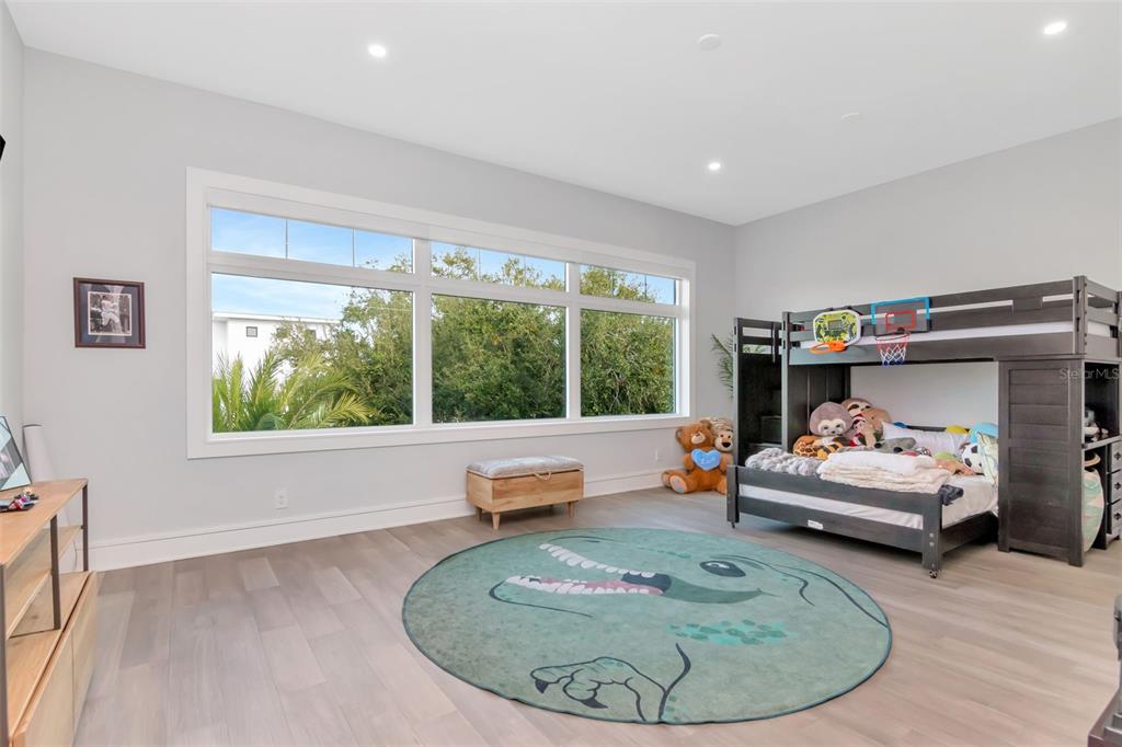 4936 West San Rafael Street Tampa, FL 33629 - Photo 23 of 42 a living room with furniture and a wooden floor
